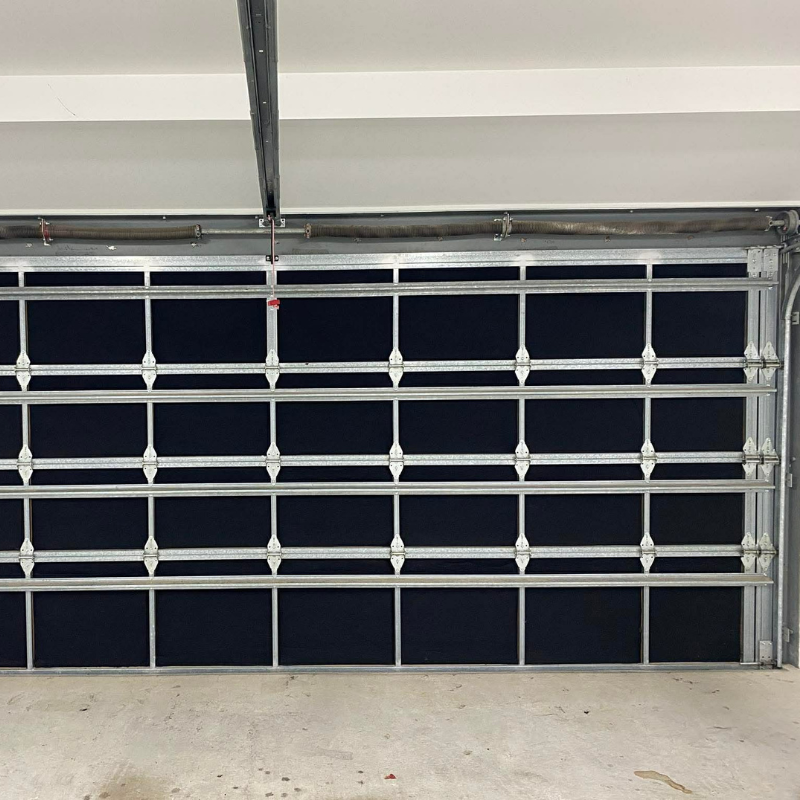 Sectional door insulated with GaraFlex 