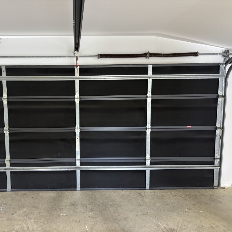 Sectional door insulated with Rubber